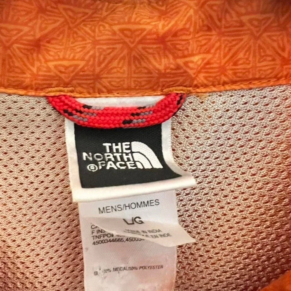 The North Face Orange button-up shirt with a boho vibe‎